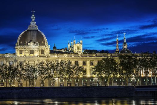 Famous Lyon city after sunset with Rhone river