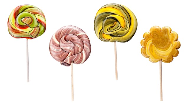 Set of twirled caramel candies on sticks, different colors. File includes clipping path