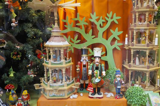 Beautifully decorated Christmas window, displaying hand made wooden decorations in Belgium, Europe