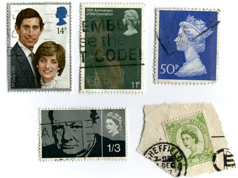 UNITED KINGDOM - CIRCA 1981: A stamp printed in England shows an image of Wedding of HRH Prince Charles to Lady Diana Spencer 29 July 1981, circa 1981.
Assortment of vintage stamps, Winston Churchill and Queen Elizabeth's stamps
