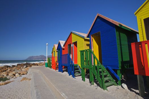 Colourful wooden changing cabins at the Beach St James Beach, Cape Town, South Africa