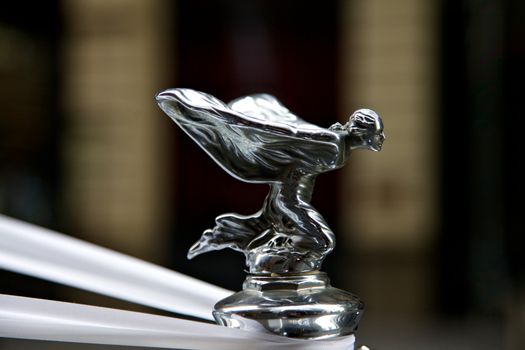 Classic Rolls Royce with the famous flying lady emblem mascot