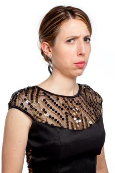 Attractive caucasion girl wearing an evening gown in her 30s shot in studio isolated on a white background