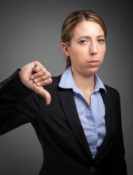 Attractive caucasion business woman in her 30s shot in studio isolated on a white background in her 30s shot in studio isolated on a grey background