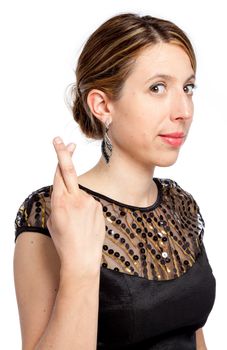 Attractive caucasion girl wearing an evening gown in her 30s shot in studio isolated on a white background