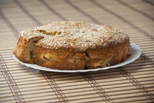 Apricot pie on plate. High resolution