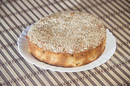 Apricot pie on plate. High resolution