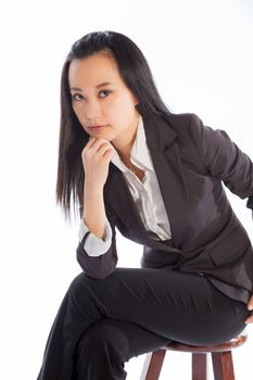 Attractive asian girl in her 30s shot in studio isolated on a white background