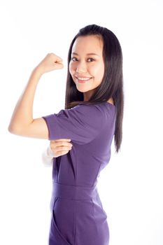 Attractive asian girl in her 30s shot in studio isolated on a white background