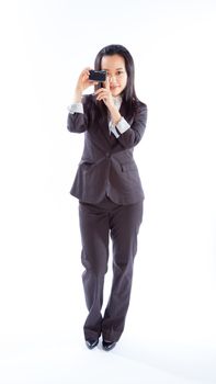 Attractive asian girl in her 30s shot in studio isolated on a white background