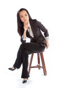 Attractive asian girl in her 30s shot in studio isolated on a white background