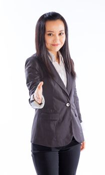 Attractive asian girl in her 30s shot in studio isolated on a white background