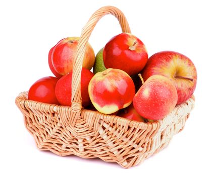 Heap of Red and Green Apples in Wicker Basket isolated on white background