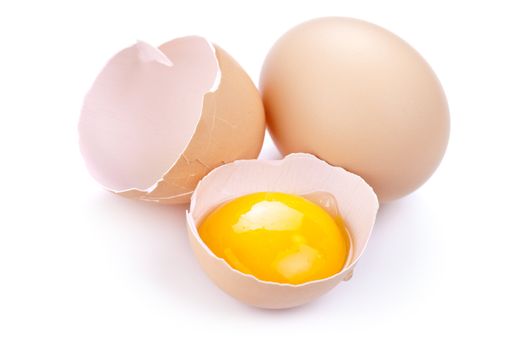 Eggs on white background. Egg yolk and eggshell