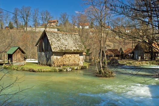 Korana river old wooden cottage in village of Rastoke