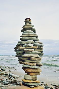 Stack of stones on the sea beach