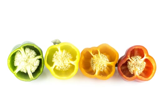 Parts of colorful sweet bell pepper on white background.