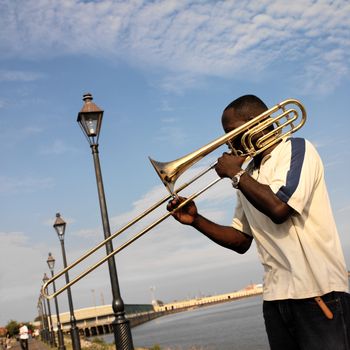 Street musician by the Mississippi in the French Quarter of New Orleans in Louisiana in the United States of America