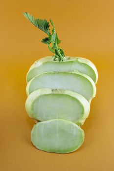 Cabbage kohlrabi on orange background