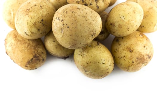 potatoes on the white background .