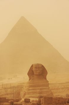 The Sphinx and Pyramid of Khafre in a sand storm, Cairo, Egypt