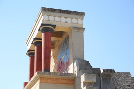 columns of an ancient palace on a background of blue sky