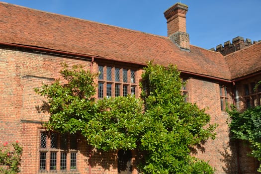 Red brick hall with trees