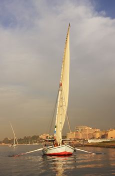 Felucca boats sailing on the Nile river, Luxor, Egypt