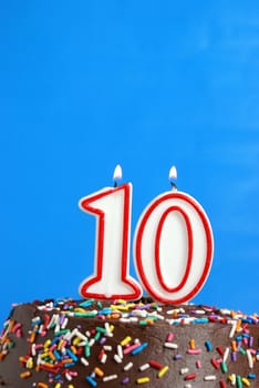 A number candle is lit in celebration of ten years.