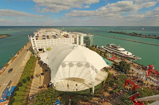 CHICAGO, ILLINOIS - SEPTEMBER 4: Aerial view of Navy Pier and the Lake Michigan shoreline in Chicago, Illinois on September 4, 2011. The Pier is a popular destination with many lakefront attractions.