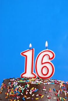 A number candle represents sixteen sweet years worth celebrating.