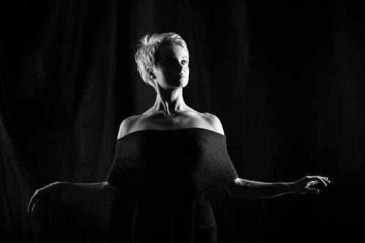 Attractive girl dancing, shot in black and white version