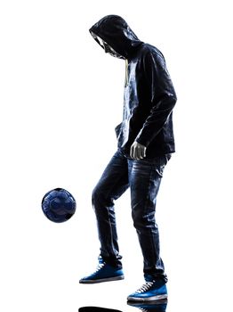 one caucasian young man soccer freestyler player  in silhouette  on white background