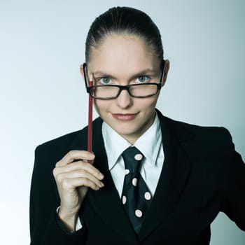 studio shot portrait of one caucasian young busines woman