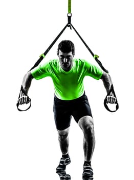 one caucasian man exercising   suspension training  trx   on white background