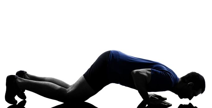 man exercising push ups workout fitness aerobics posture in silhouette studio isolated on white background