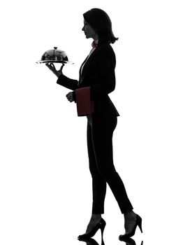 one caucasian woman waiter butler serving dinner with catering dome in silhouette  on white background