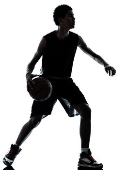 one young man basketball player silhouette in studio isolated on white background