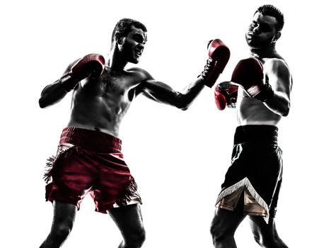 two caucasian  men exercising thai boxing in silhouette studio  on white background