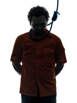 one caucasian criminal man with hangman noose around the neck in silhouette studio isolated on white background