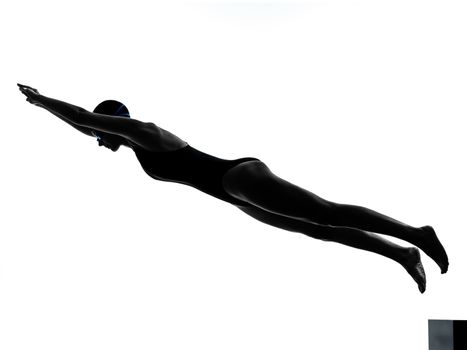one caucasian woman competition swimmer on starting in silhouette studio isolated on white background
