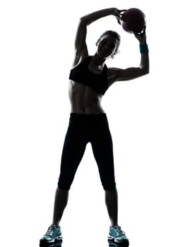 one caucasian woman exercising fitness ball workout posture in silhouette studio isolated on white background