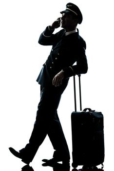 one caucasian man in airline pilot uniform  in studio isolated on white background