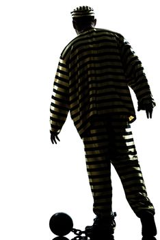 one caucasian man prisoner criminal with chain ball in studio isolated on white background