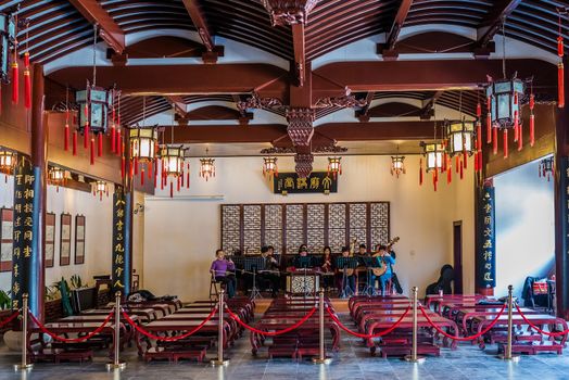 Shanghai, China - April 7, 2013: musicians orchestra playing in Wen Miao confucius temple  at the city of Shanghai in China on april 7th, 2013