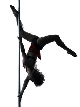 one caucasian woman pole dancer dancing in silhouette studio isolated on white background