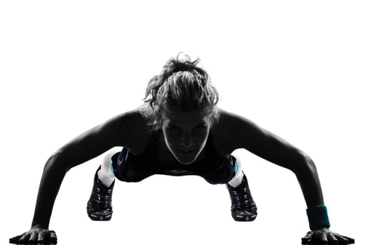 one caucasian woman workout fitness posture body building exercise push ups exercising on studio isolated white background
