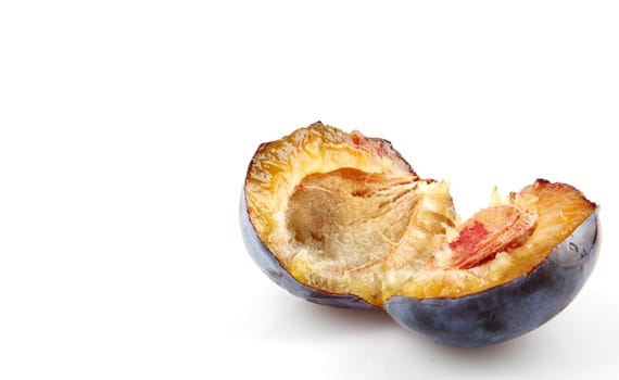 Plums On A White Background