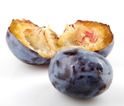 Plums On A White Background