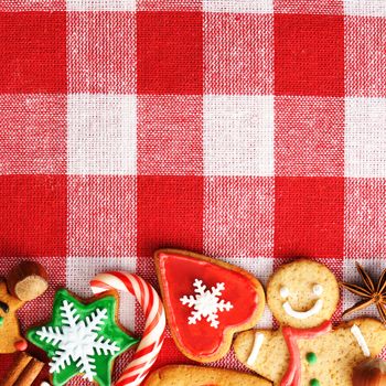 Christmas gingerbread cookies over tablecloth